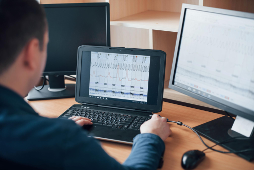 Polygraph examiner reviewing test results